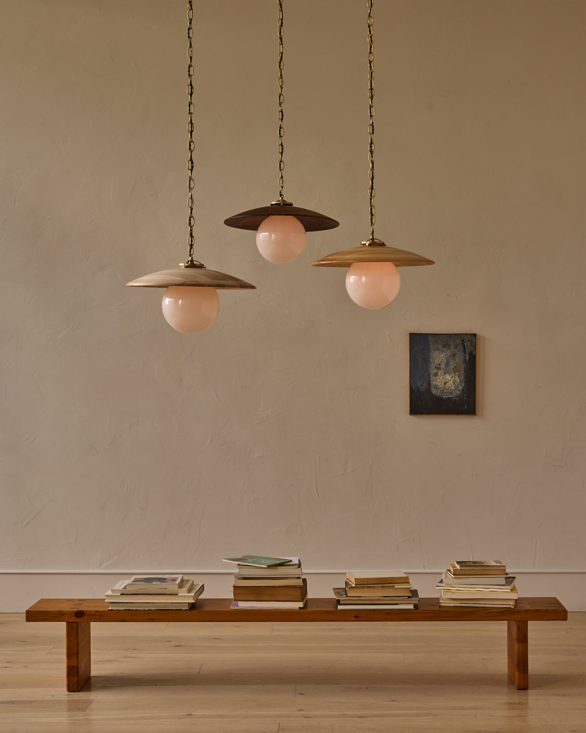 Large pendant light with oversized clear glass globe and decorative wooden clear maple shade with brass chain #shade-finish_black walnut #globe_white glass #cord-color_brown