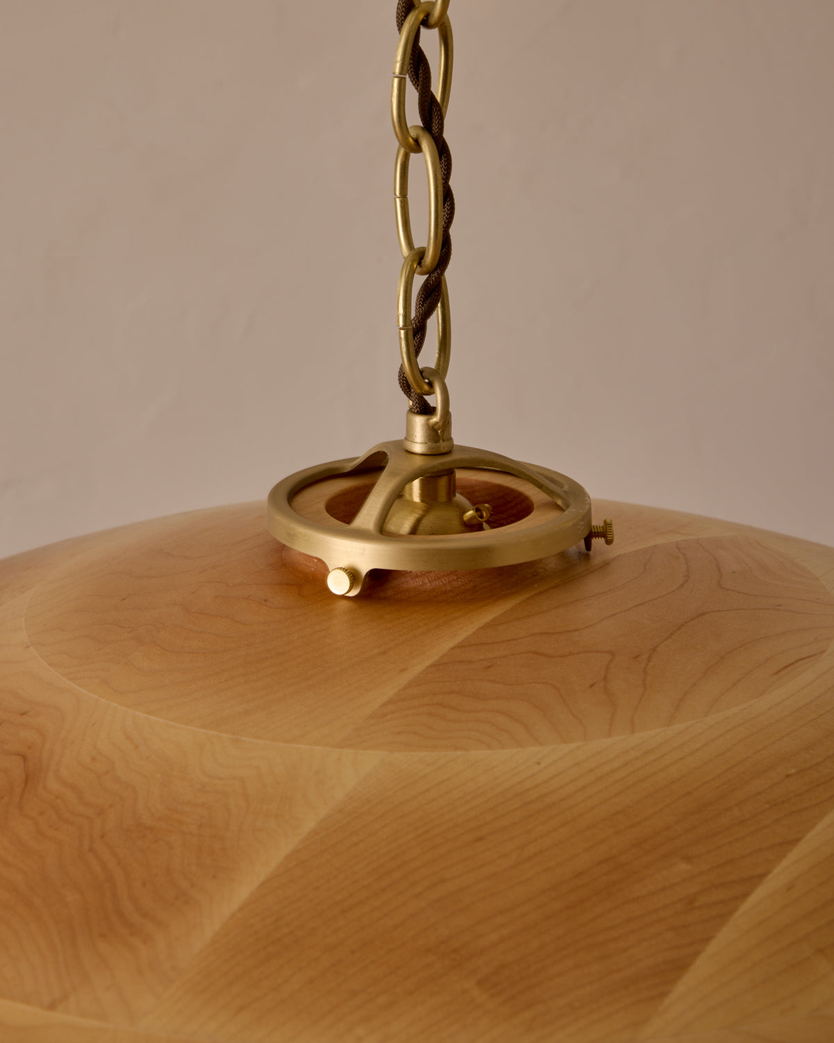 Large pendant light with oversized clear glass globe and decorative wooden clear maple shade with brass chain #shade-finish_natural maple #cord-color_brown