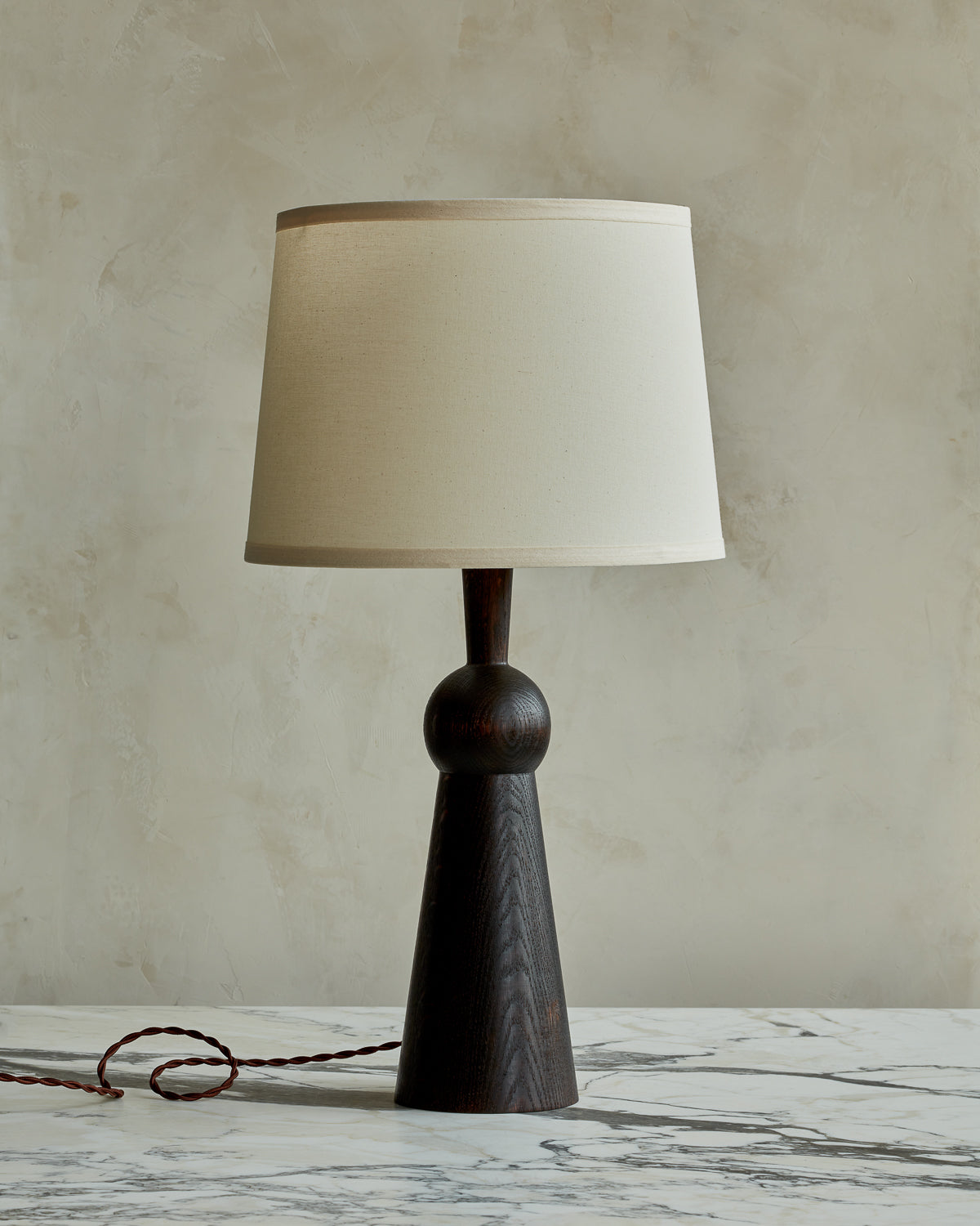 Dark wash solid wood table lamp with gently tapered body and ivory linen shade #wood-finish_dark wash red oak #shade-color_ivory linen