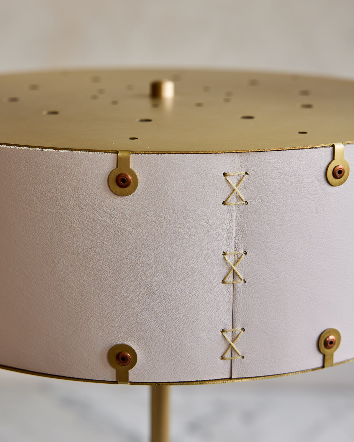 Brass table lamp with walnut base and white leather shade #color_dogwood