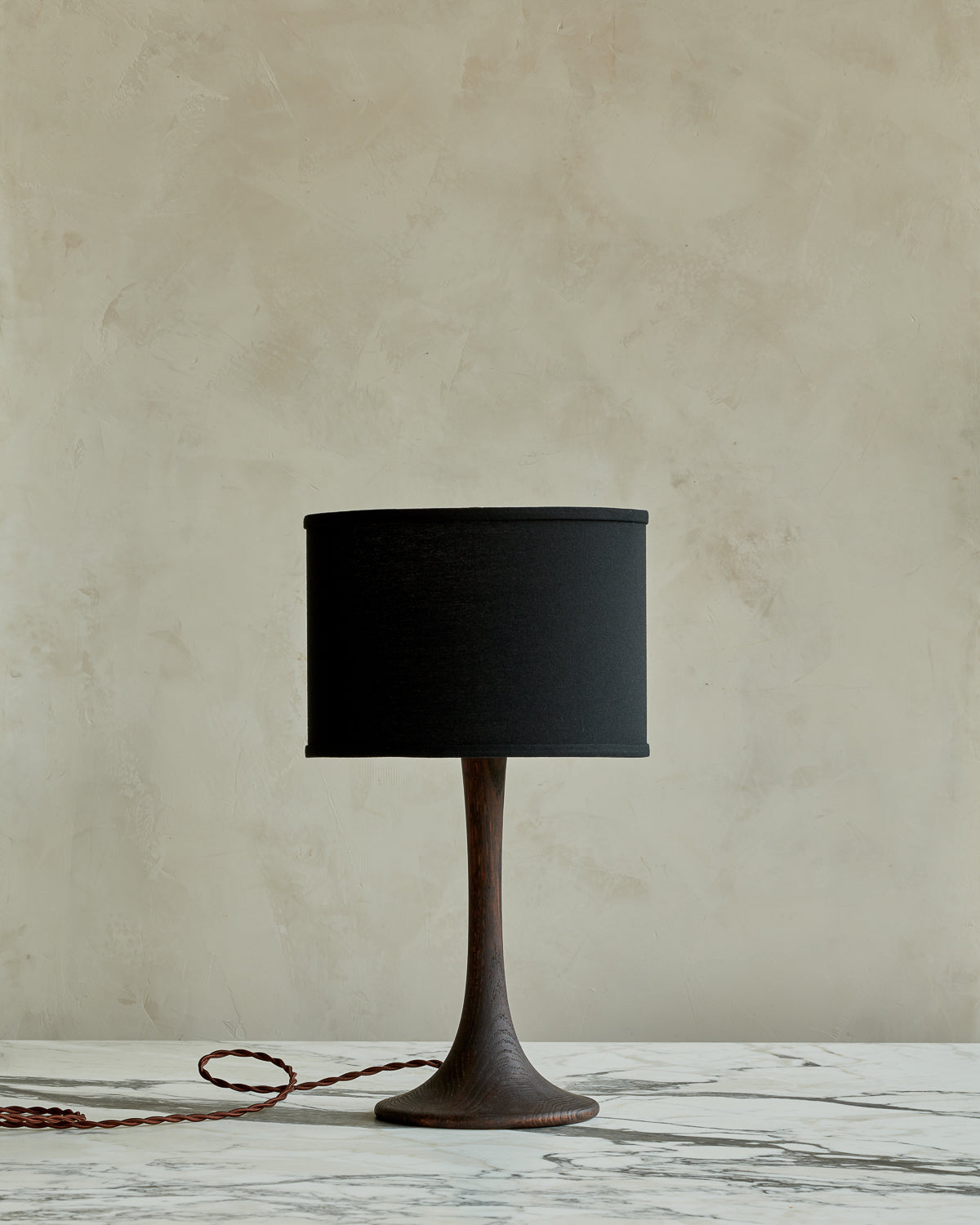 Small Trumpet table lamp with dark wash finish and black drum shade #wood-finish_dark wash red oak #shade-color_black linen