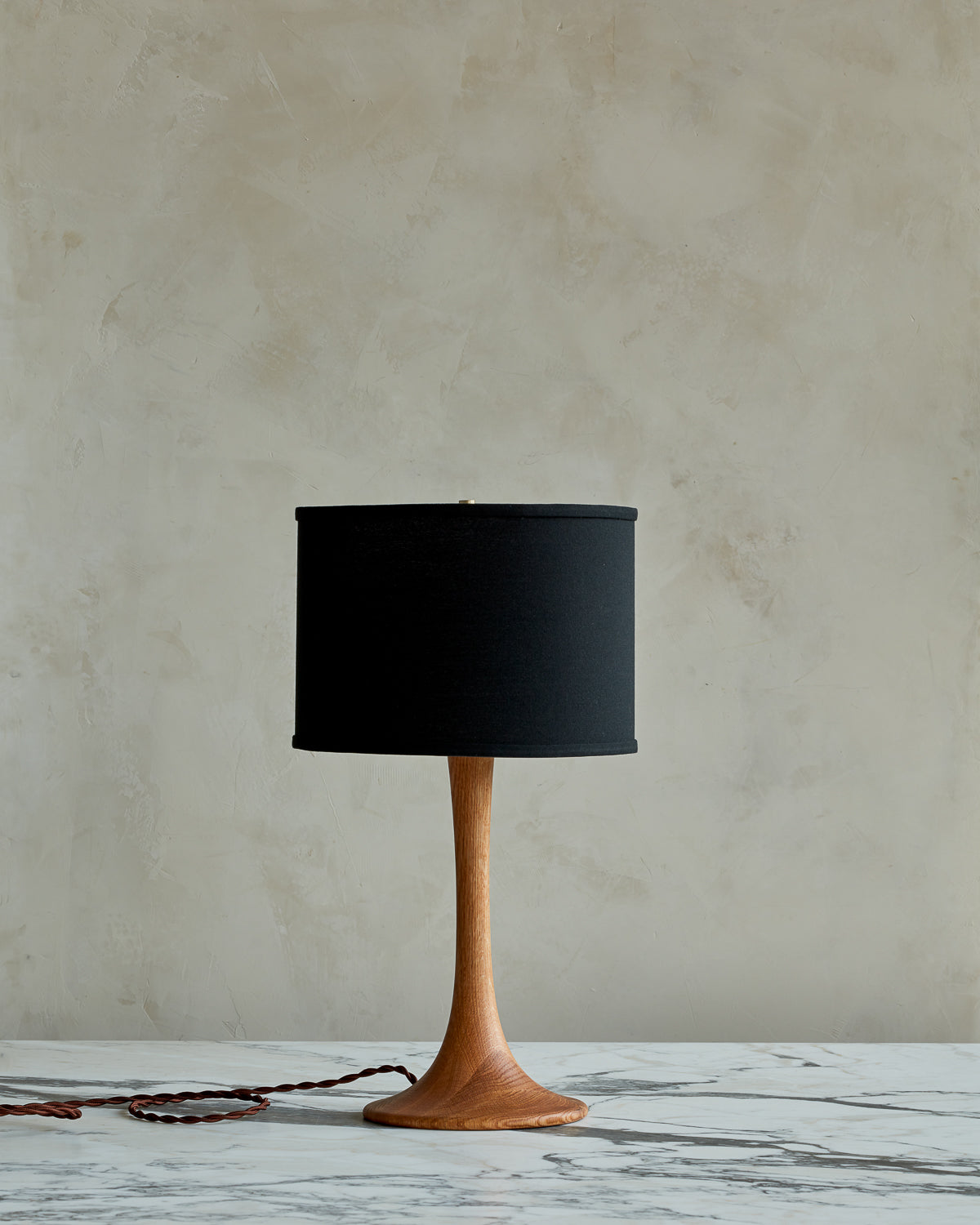 Small Trumpet table lamp with natural finish and black drum shade #wood-finish_natural red oak #shade-color_black linen