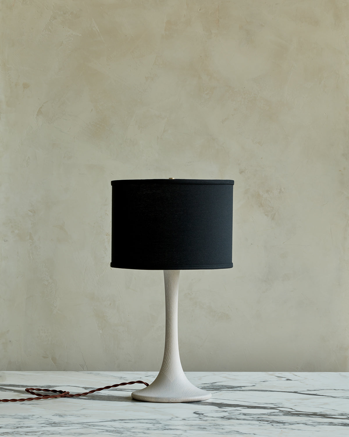 Small Trumpet table lamp with white wash finish and black drum shade #wood-finish_white wash red oak #shade-color_black linen