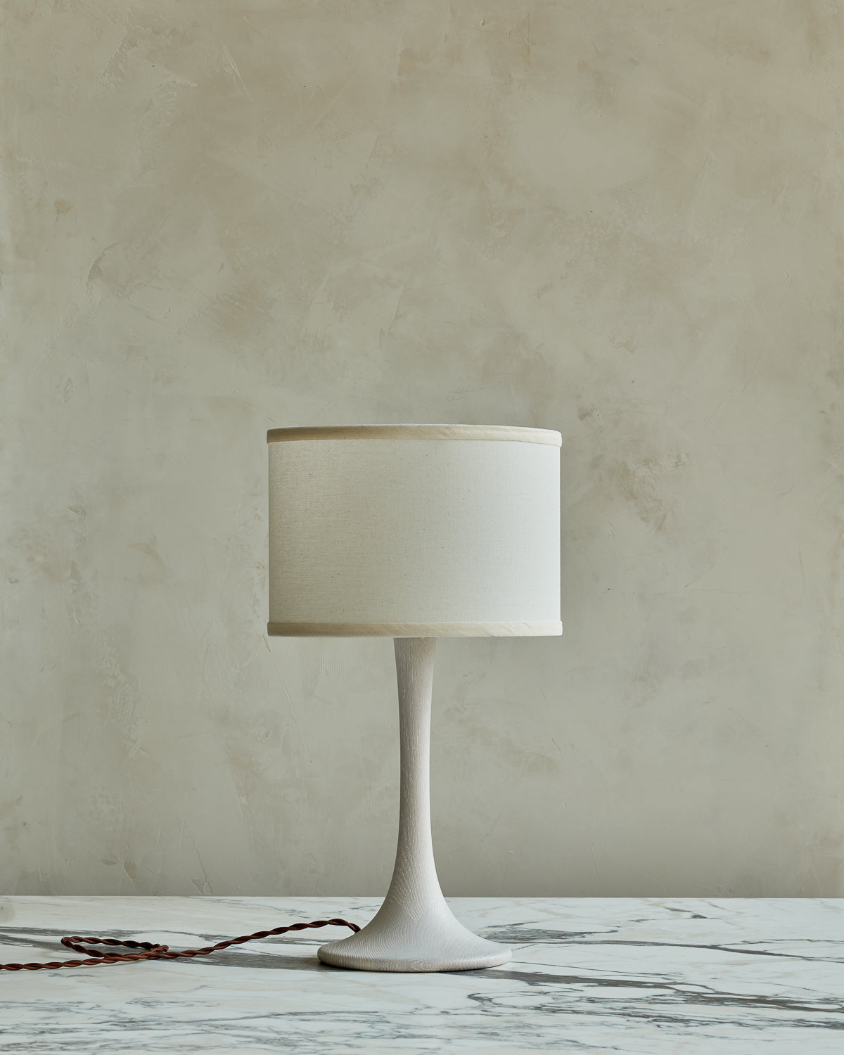 Small Trumpet table lamp with white wash finish and ivory drum shade #wood-finish_white wash red oak #shade-color_ivory linen