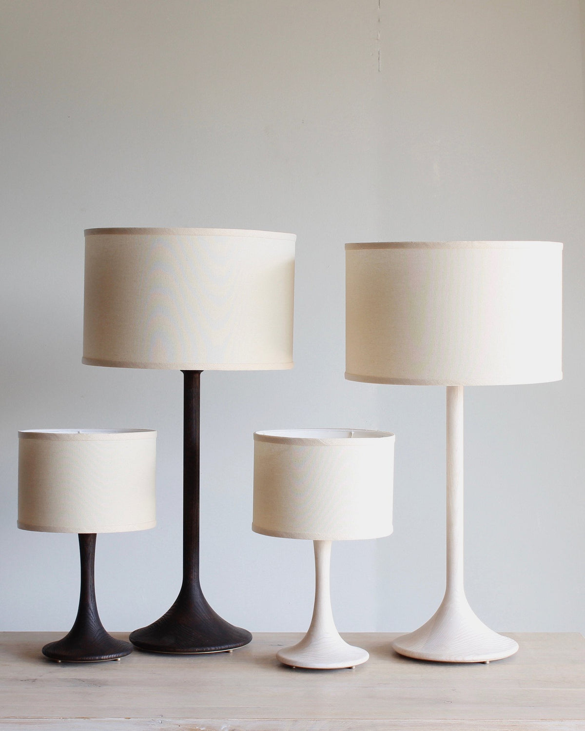 Collection of Lostine trumpet table lamps with graceful profile #wood-finish_dark wash red oak