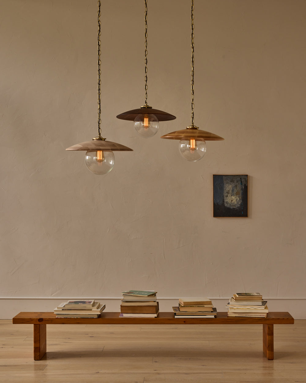 Large pendant light with oversized clear glass globe and decorative wooden clear maple shade with brass chain  #shade-finish_natural maple #globe_clear glass #cord-color_brown