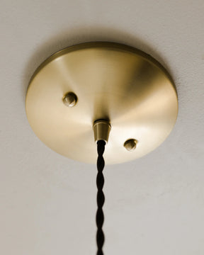 Small Pendant light with clear glass globe and decorative matte green ceramic shade