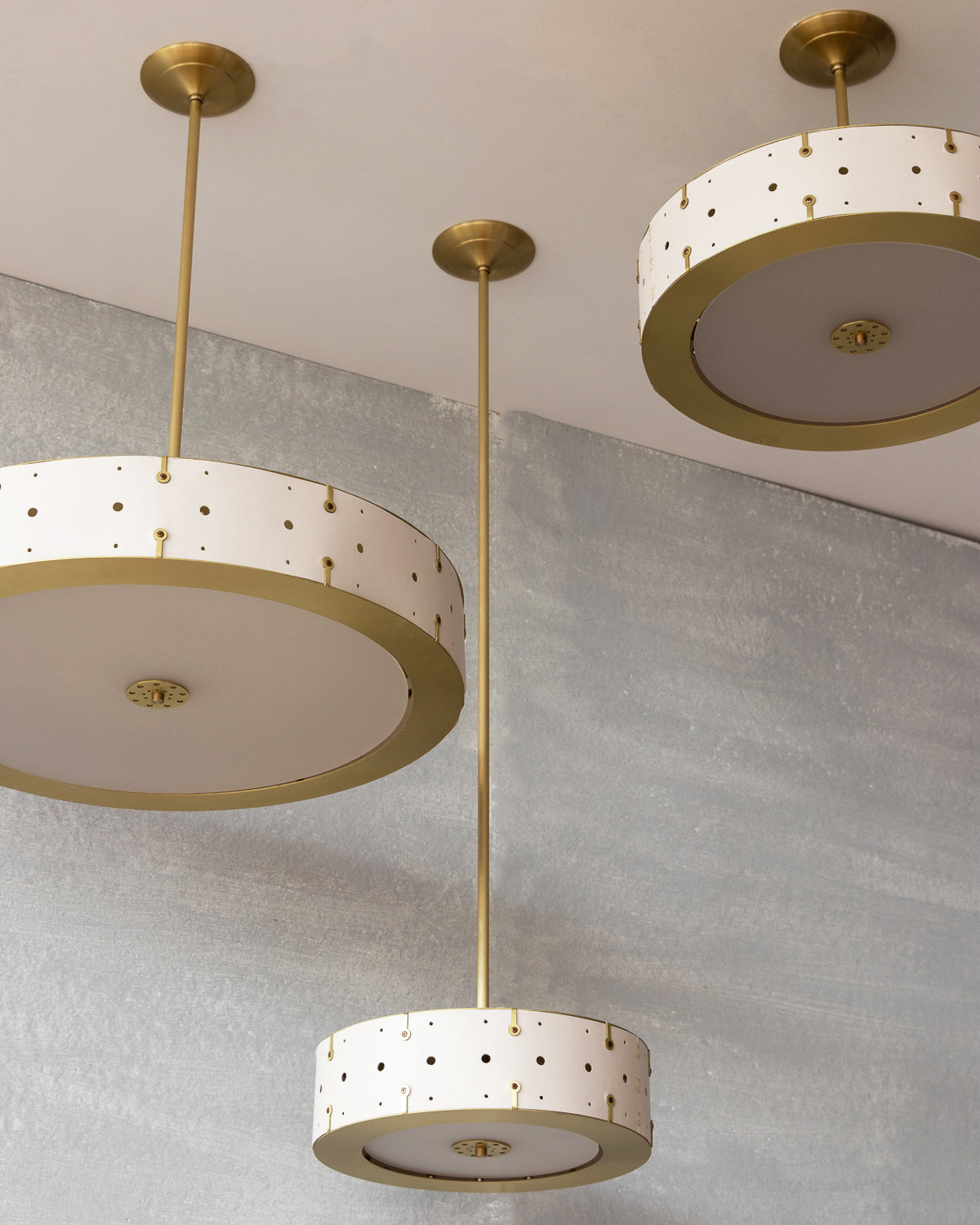 Beautiful satin brass ceiling pendant fixture with handstitched leather drum shade and customizable drop
#leather-color_dogwood