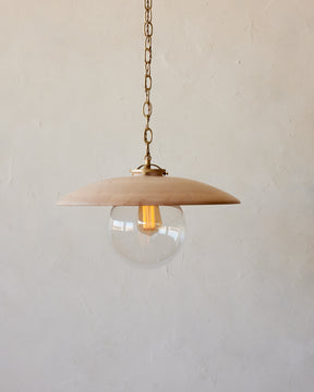 Large pendant light with oversized clear glass globe and decorative wooden clear maple shade with brass chain