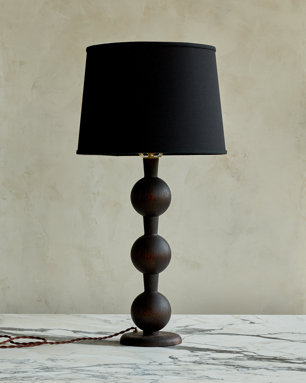 Sculptural solid wood table lamp with barbell design in dark wash finish with black linen shade #wood-finish_dark wash red oak