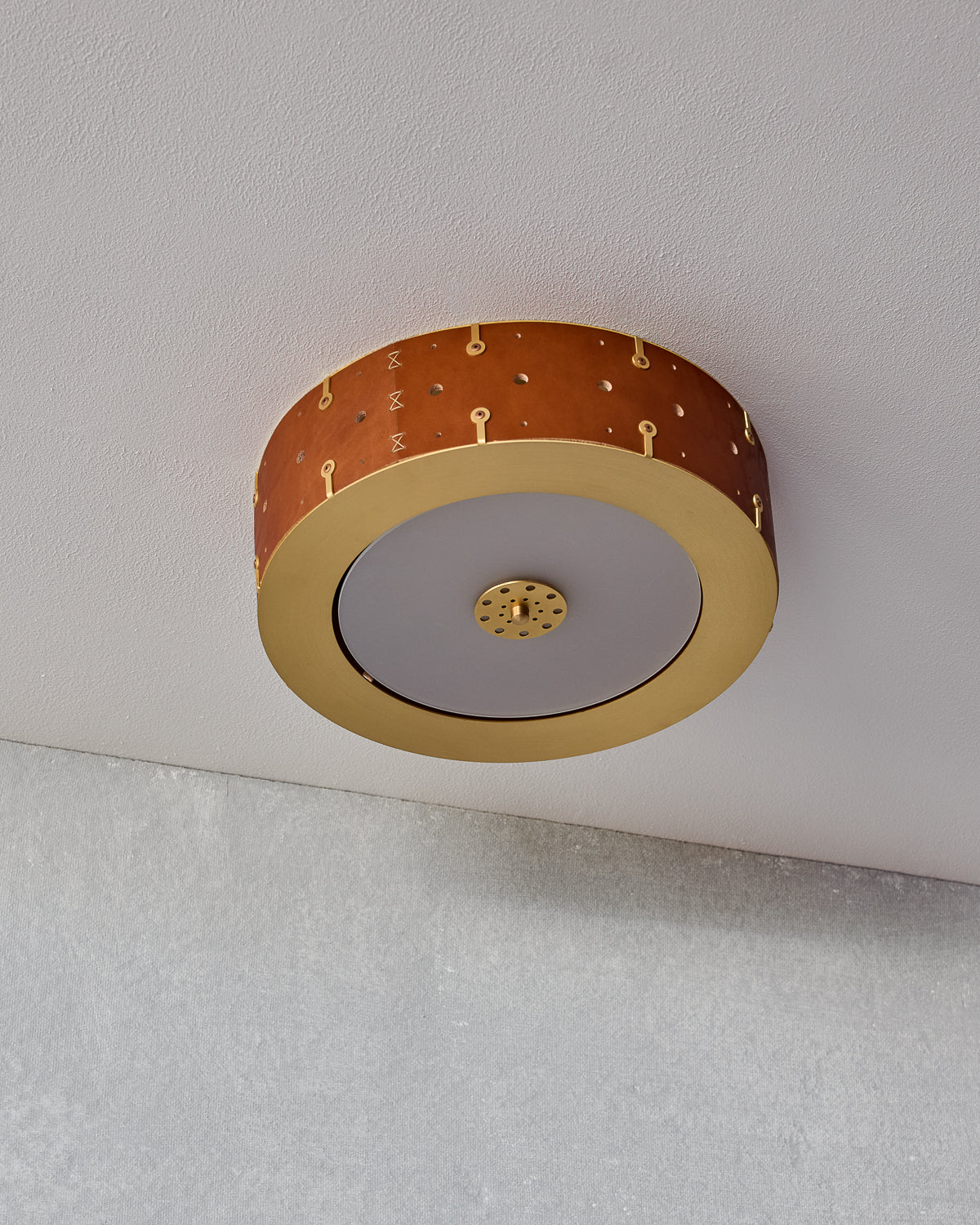 Beautiful satin brass flush mount ceiling fixture with handstitched leather drum shade #leather-color_tan harness #size_14" drum