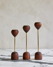 Modern black walnut and brass flower inspired candle holder
