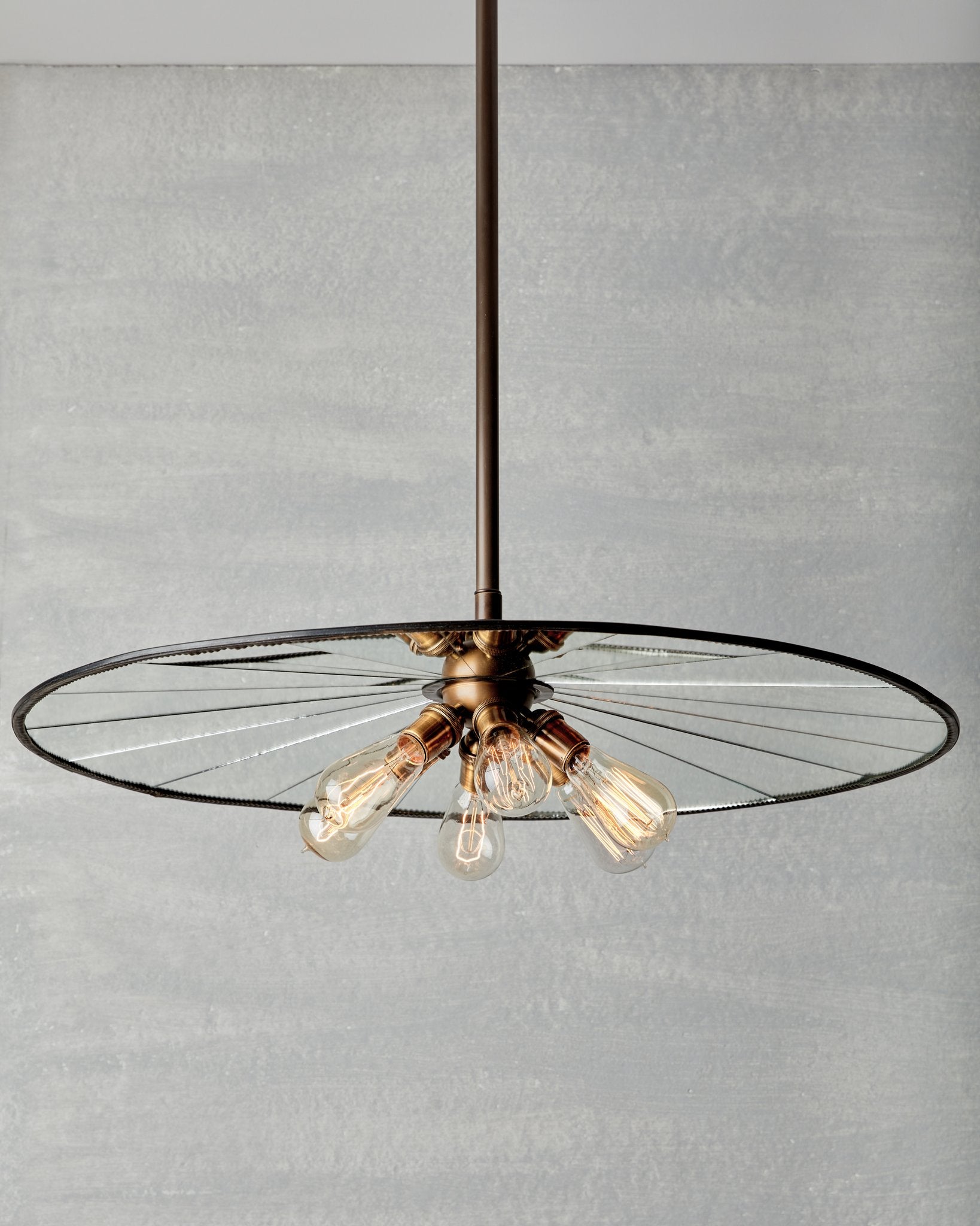 Large flat mirrored ceiling pendant with exposed lightbulbs. Made by RTO Lighting in Philadelphia. Hardwired light fixture. Simple interior design, made in the USA.